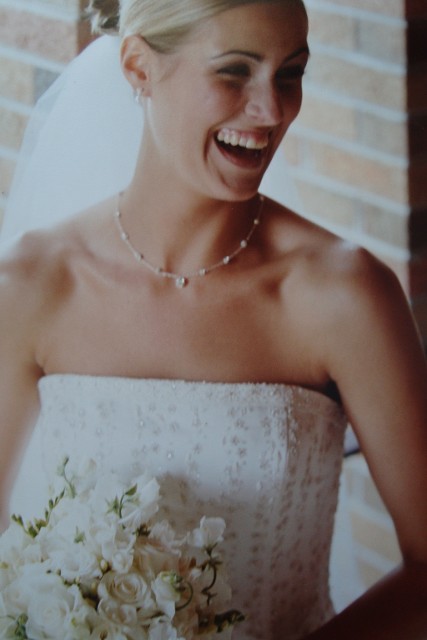 Smiling Bride with Bouquet
